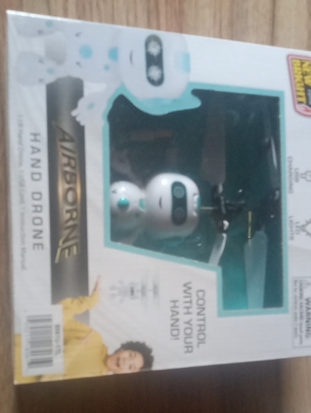 Airborne Hand Drone - White & Teal Robotic Flyer